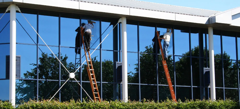 Cleaning residential tinted windows