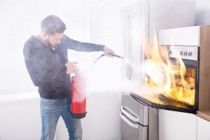 how to put out an oven fire