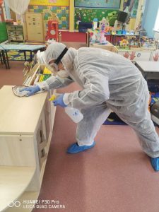 fantastic technician disinfecting class room