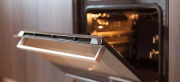Why does my oven smell bad