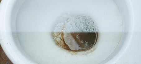stained toilet bowl before and after