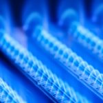 Blue flames of a gas burner inside your boiler