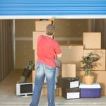 Man putting personal items in self-storage