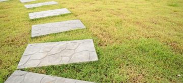 paving slabs on grass