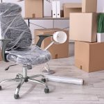 Packed office furniture ready to move