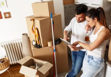 Couple moving out and checking end of tenancy cleaners and service prices