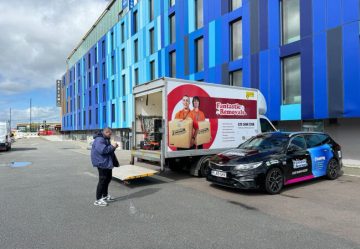 Fantastic Services vehicles in front of Atrium Hotel in London