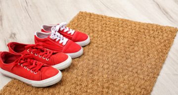 Red shoes on a coir carpet