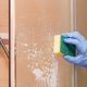 Cleaning shower screen with sponge