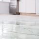 fridge leaking water on the floor