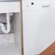 Troubled woman got into situation of leaking pipe in the kitchen